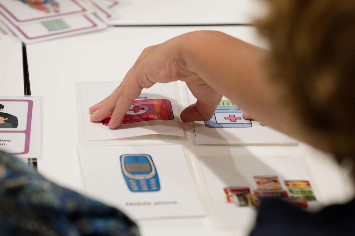 Selecting items for a preparedness kit.